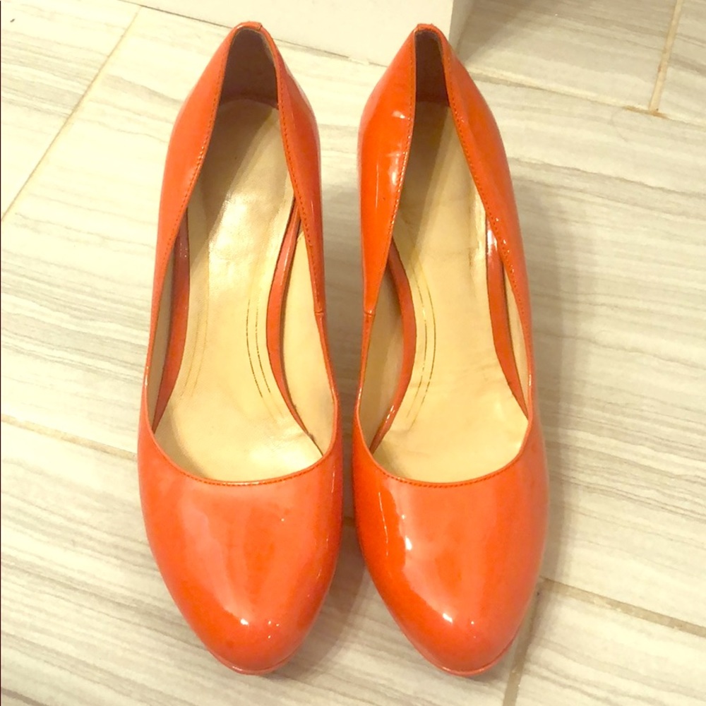Authentic Cole Hahn (with Nike Air) orange heels.